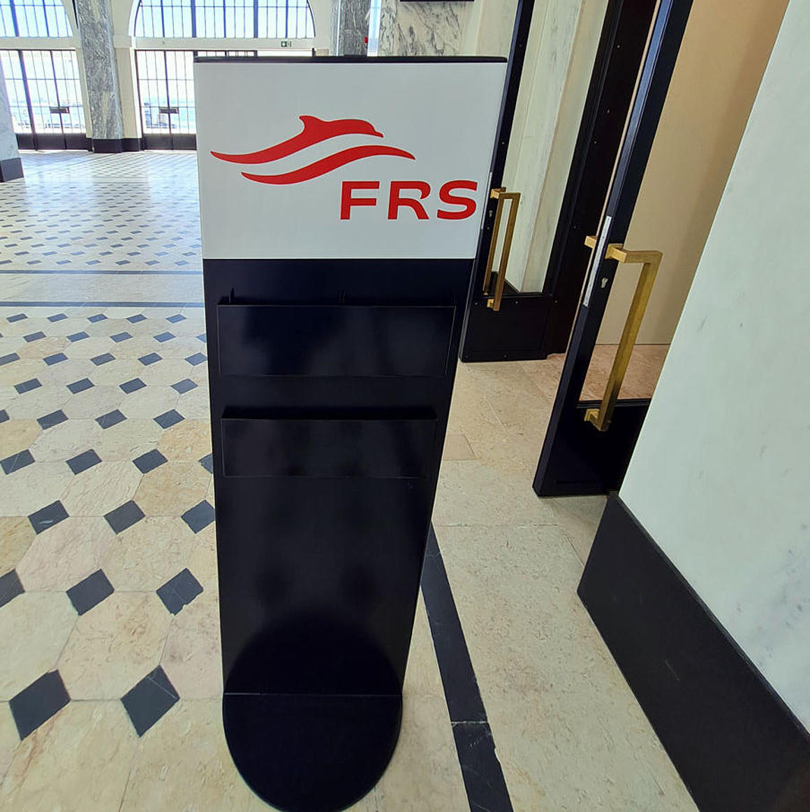 Sign of the FRS Portugal logo in the terminal in Lisbon.